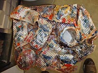 wall hanging with white glaze in mouth opening